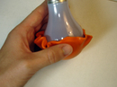 2. Push clay up around light bulb