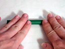 Rolling the pen to smooth the seam